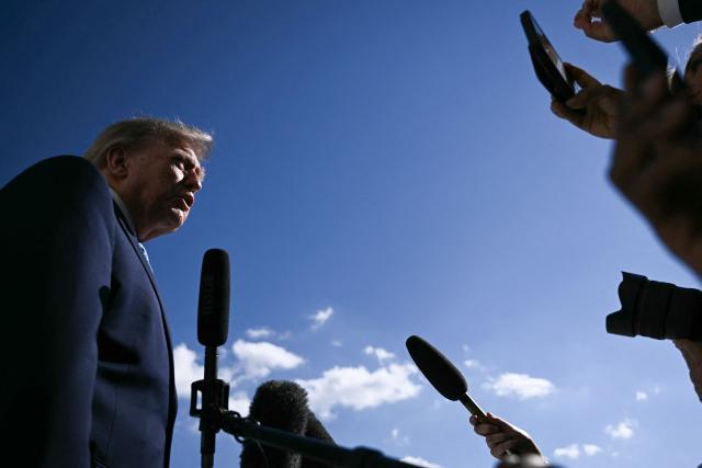 US President Donald Trump speaks to the press before departing from the South Lawn of the White House in Washington, DC, on October 5, 2026. Trump is travelling to Nebraska to speak at a campaign rally. (Photo by Brendan SMIALOWSKI / AFP)