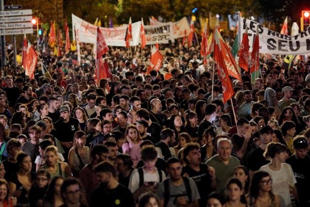 Demonstrators protest against evictions and high rent prices on plaza Tetuan in Barcelona on October 5, 2026. Spain's Socialist Prime Minister on October 5, 2026 called a snap election for November 29, after parliament rejected housing relief measures proposed by his minority government amid nationwide protests against evictions and high rent prices. (Photo by Manaure Quintero / AFP)