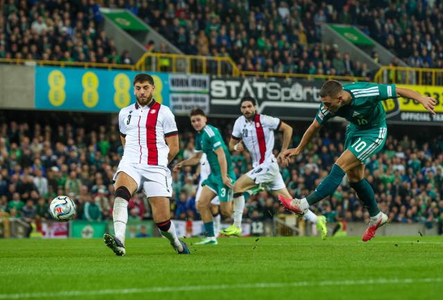 Northern Ireland's striker #10 Jamie Donley shoots wide during the UEFA Nations League, League B, Group 2 match between Northern Ireland and Georgia at Windsor Park in Belfast, Northern Ireland on October 5, 2026. (Photo by Paul Faith / AFP)