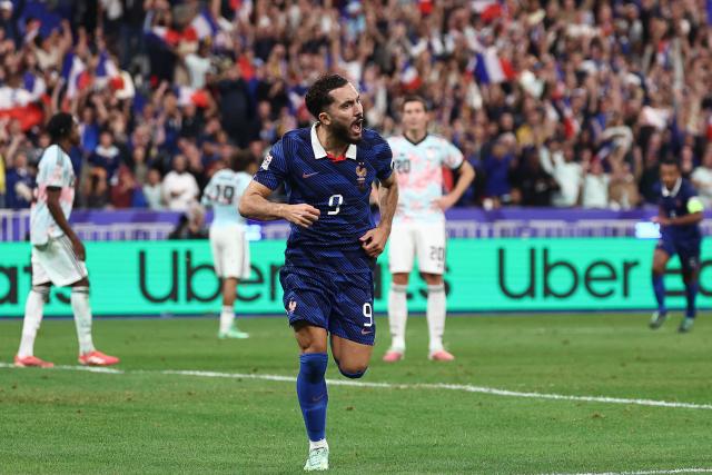 France's midfielder #09 Rayan Cherki celebrates  after scoring his team's second goal during the UEFA Nations League Group A1 football match between France and Belgium at the Stade de France in Saint-Denis, north of Paris, on October 5, 2026. (Photo by FRANCK FIFE / AFP)