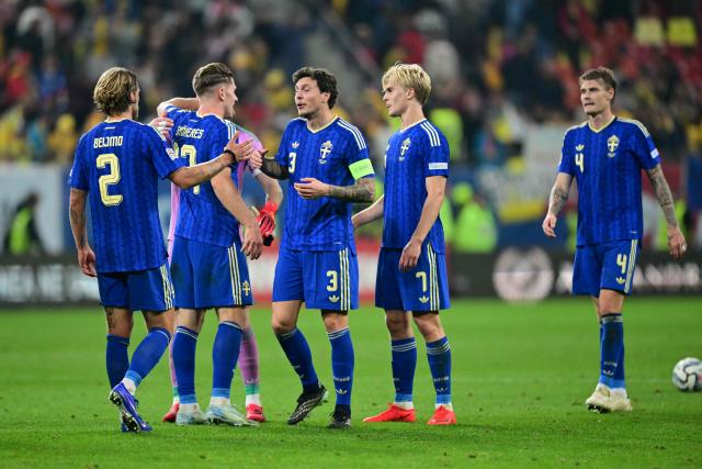 Sweden's players (from L) Sweden's defender #02 Felix Beijmo, Sweden's forward #17 Viktor Gyokeres, Sweden's midfielder #07 Lucas Bergvall and Sweden's defender #04 Eric Smith celebrate after the UEFA Nations League Group B4 football match between Romania and Sweden in Bucharest on October 5, 2026. (Photo by Daniel MIHAILESCU / AFP)