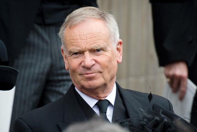 (FILES) British author and former MP Jeffrey Archer leaves St Paul's Cathedral at the end of British former prime minister Margaret Thatchers ceremonial funeral in central London on April 17, 2013. The British author has died aged 86 his publisher announced on October 5, 2026. (Photo by LEON NEAL / AFP)