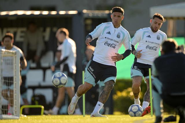 Argentina's midfielder Enzo Fernandez (L) kicks the ball during a football training session at the Argentine Football Association (AFA) training camp in Ezeiza, Buenos Aires Province, on October 5, 2026, ahead of the friendly match against Benin. (Photo by JUAN MABROMATA / AFP)
