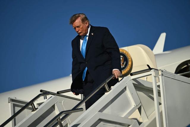 US President Donald Trump steps off Air Force One upon arrival at Central Nebraska Regional Airport in Grand Island, Nebraska, on October 5, 2026. (Photo by Kent NISHIMURA / AFP)