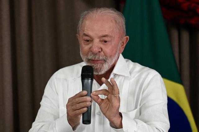Brazil's President and re-election candidate for the Workers' Party (PT) Luiz Inacio Lula da Silva speaks during a meeting with political allies to discuss strategies for the presidential election runoff in Brasilia on October 5, 2026. Right-wing senator Flavio Bolsonaro pulled off a surprise first-place finish ahead of President Luiz Inacio Lula da Silva in the election on October 4, 2026, which heads to a run-off in three weeks as neither clinched a majority. (Photo by Evaristo Sa / AFP)