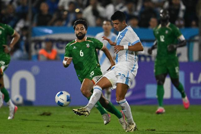 Guatemala's midfielder #22 Jonathan Franco (R) kicks the ball past Suriname's midfielder #06 Pherai Immanuel during the Concacaf Nations League Cup football match between Guatemala and Suriname at the Manuel Felipe Carrera stadium in Guatemala City on October 5, 2026. (Photo by Johan ORDONEZ / AFP)