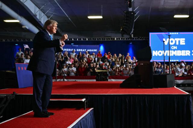 US President Donald Trump dances after speaking during a campaign rally at Pinnacle Bank Expo Center in Grand Island, Nebraska, on October 5, 2026. (Photo by Kent NISHIMURA / AFP)