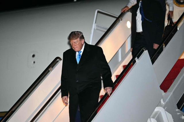 US President Donald Trump disembarks from Air Force One at Joint Base Andrews, Maryland, on October 5, 2026. Trump is returning from Nebraska where he spoke at a campaign rally. (Photo by Kent NISHIMURA / AFP)