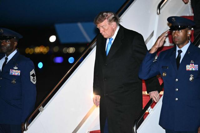 US President Donald Trump disembarks from Air Force One at Joint Base Andrews, Maryland, on October 5, 2026. Trump is returning from Nebraska where he spoke at a campaign rally. (Photo by Kent NISHIMURA / AFP)