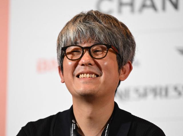 South Korean Director Kim Jong-kwan attends a press conference for the opening film "The Table: Day and Night" of the 31st Busan International Film Festival (BIFF) at the Busan Cinema Center in Busan on October 6, 2026. (Photo by Jung Yeon-je / AFP)