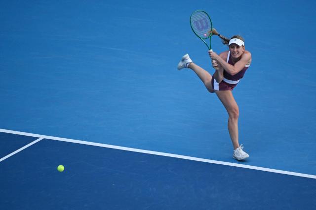Russia's Ekaterina Alexandrova hits a return to Czech Republic's Linda Noskova during their women's singles match at the China Open tennis tournament in Beijing on October 6, 2026. (Photo by Adek BERRY / AFP)