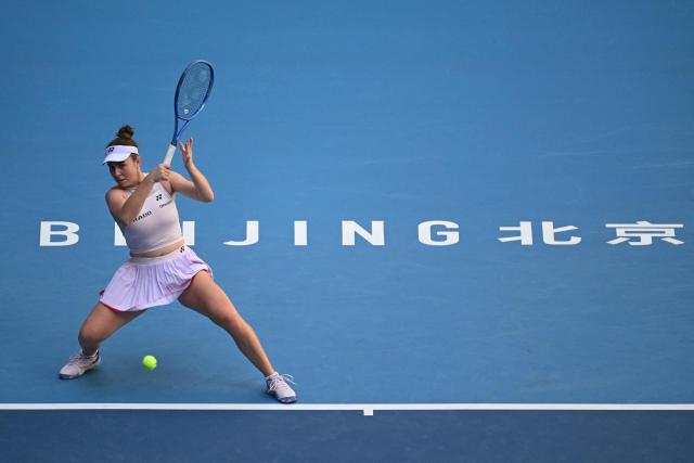 Czech Republic's Linda Noskova hits a return to Russia's Ekaterina Alexandrova during their women's singles match at the China Open tennis tournament in Beijing on October 6, 2026. (Photo by Adek BERRY / AFP)