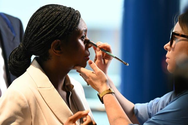 Britain's main opposition Conservative Party leader Kemi Badenoch is prepared ahead of giving an interview on day three of the annual Conservative Party conference in Birmingham, central England, on October 6, 2026.  (Photo by Oli SCARFF / AFP)