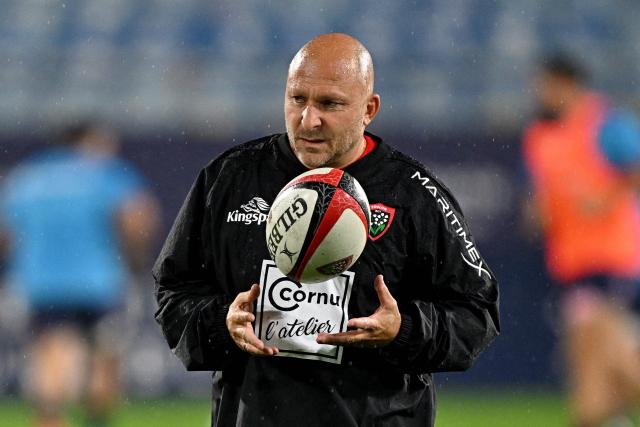 (FILES) Toulon's French director of rugby Pierre Mignoni looks on prior the French Top 14 rugby union match between Montpellier Herault Rugby (MHR) and Rugby Club Toulonnais (RCT) at the Stade de la Mosson in Montpellier, southern France, on October 4, 2026. The Toulon rugby club announced the departure of Director of Rugby Pierre Mignoni on October 6, 2026, following a string of poor sporting performances. (Photo by Gabriel BOUYS / AFP)