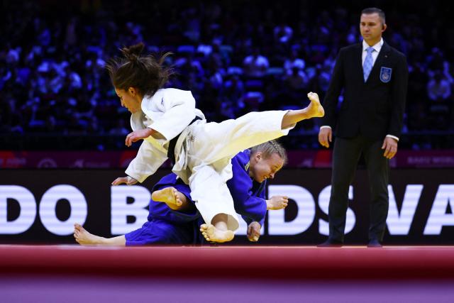 Israel's Timna Nelson Levy (white) competes against Finland's Pihla Salonen in the women's under 57 kg round of 32 at the World Judo Championships in Baku on October 6, 2026. (Photo by Anne-Christine POUJOULAT / AFP)