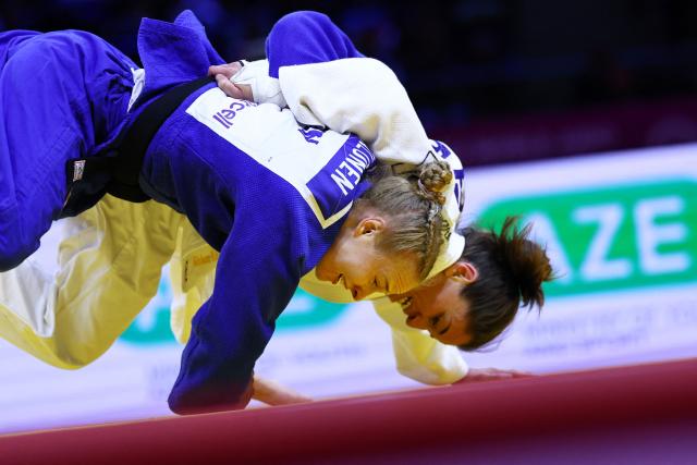 Israel's Timna Nelson Levy (white) competes against Finland's Pihla Salonen in the women's under 57 kg round of 32 at the World Judo Championships in Baku on October 6, 2026. (Photo by Anne-Christine POUJOULAT / AFP)
