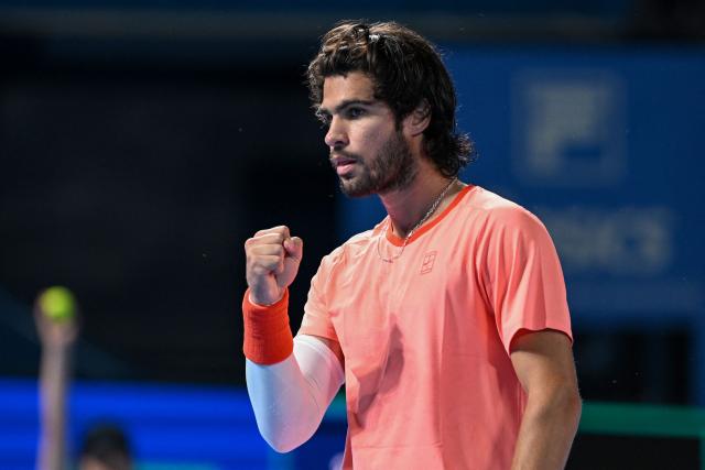 Spain's Carlos Alcaraz reacts after a point against Czech Republic's Jiri Lehecka in the men's singles final during the Japan Open tennis tournament at the Ariake Tennis Forest Park in Tokyo on October 6, 2026. (Photo by Rie KIKUCHI / AFP)