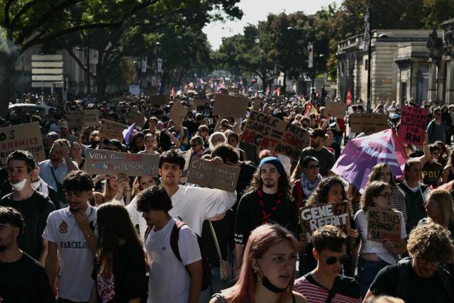 Protestors march along a street during a demonstration of high-school students as part of a nationwide protest movement over learning conditions in the south-western city of Bordeaux on October 6, 2026. Since late September, pupils have barred the entrances to hundreds of schools, complaining of teacher absences, overloaded timetables, dilapidated classrooms and buildings ill-adapted to rising temperatures, among other grievances. (Photo by Philippe LOPEZ / AFP)