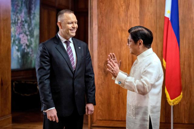 Philippines President Ferdinand Marcos Jr (R) speaks with Polish President Karol Nawrocki during a bilateral meeting at Malacanang Palace in Manila on October 6, 2026. (Photo by Ezra Acayan / POOL / AFP)