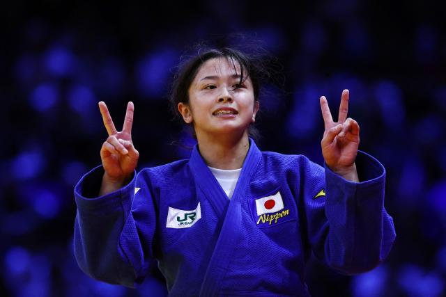 Japan's Akari Omori reacts after winning the women's under 57 kg category gold medal bout at the World Judo Championships in Baku on October 6, 2026. (Photo by Anne-Christine POUJOULAT / AFP)