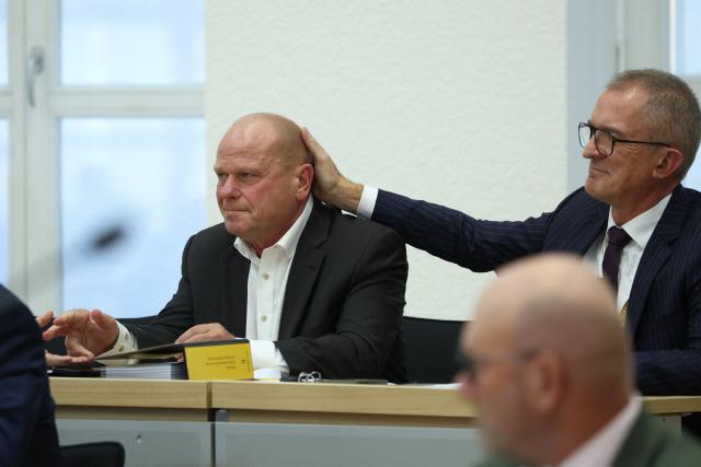 CDU politician Carsten Borchert (L), newly elected Deputy President of the State Parliament, is congratulated by CDU politician Marco Tullner during a session at the State Parliament in Magdeburg, eastern Germany on October 6, 2026, as the state parliament of Saxony-Anhalt convenes for the first time since the state elections. The AfD became Germany's first far-right party to win the post of speaker in a state parliament since World War II, when its candidate was elected in an eastern region. The Alternative for Germany (AfD) took nearly 44 percent of the September 2026 vote in Saxony Anhalt state in the former communist East Germany, easily beating the centre-right CDU of unpopular Chancellor Friedrich Merz. (Photo by Ronny HARTMANN / POOL / AFP)