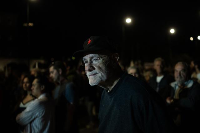A protester stands outside the Greek Parliament during a demonstration against the official visit of US Secretary of State Marco Rubio to Athens, on October 6, 2026. More than 2,000 protesters, according to the police, gathered in central Athens on Tuesday evening to protest against the visit of U.S. Secretary of State Marco Rubio to Greece. (Photo by Aris MESSINIS / AFP)