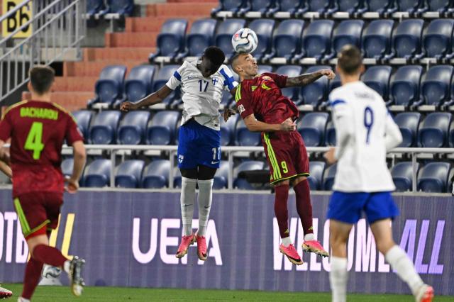 Finland's defender #17 Ryan Mahuta (2L) and Belarus' midfielder#09 Max Ebong Ngome jump to head the ball during the UEFA Nations League Group C1 football match between Belarus and Finland in Budapest, Hungary on October 6, 2026. (Photo by Attila KISBENEDEK / AFP)