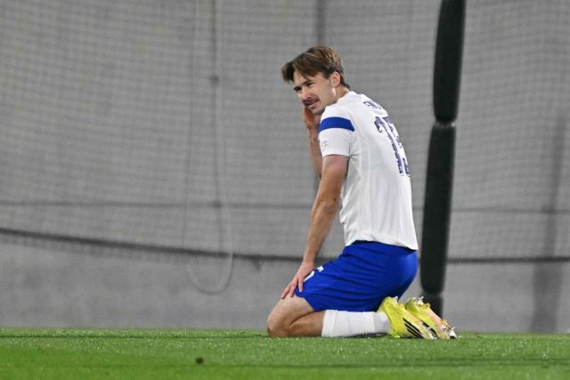 Finland's defender #15 Miro Tenho reacts during the UEFA Nations League Group C1 football match between Belarus and Finland in Budapest, Hungary on October 6, 2026. (Photo by Attila KISBENEDEK / AFP)