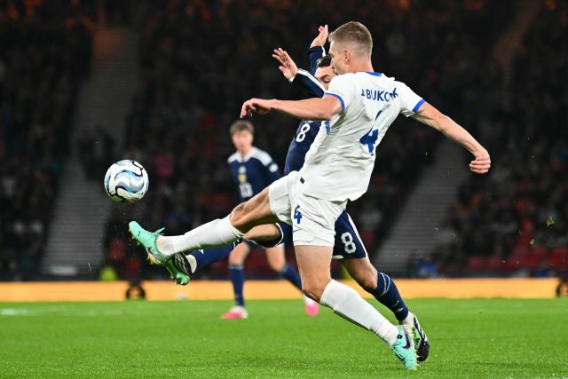 Slovenia's midfielder Mark Zabukovnik (R) vies with Scotland's midfielder #08 Billy Gilmour during the UEFA Nations League, League B, Group 1 football match between Scotland and Slovenia at Hampden Park in Glasgow, Scotland on October 6, 2026.  (Photo by ANDY BUCHANAN / AFP)