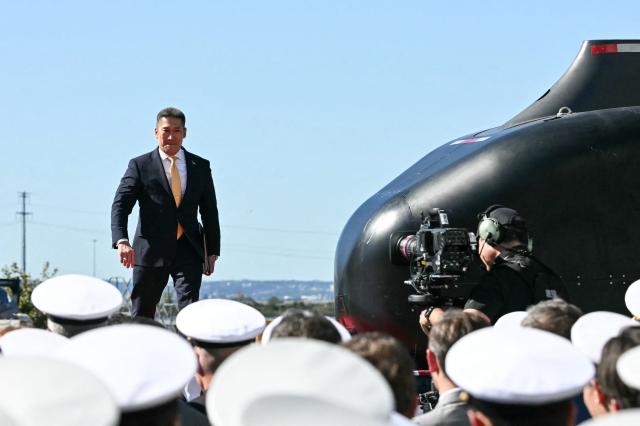 US Acting Secretary of the Navy Hung Cao arrives to speak ahead of President Donald Trump's appearance at Anduril Industries in Sparrows Point, Maryland, on October 6, 2026. Anduril Industries is making an announcement about its future plans at the former Bethlehem Steel location. (Photo by Jim WATSON / AFP)