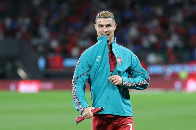 (FILES) Portugal's forward #07 Cristiano Ronaldo gestures ahead of the UEFA Nations League league phase group A4 football match between Portugal and Wales at Jose Alvalade stadium in Lisbon on September 24, 2026. Cristiano Ronaldo opens door for Portugal return, apologises for walk-out, AFP reports on October 6, 2026. (Photo by Patricia de Melo Moreira / AFP)