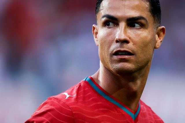 (FILES) Portugal's forward Cristiano Ronaldo is pictured before the international friendly football match between Portugal and Nigeria at Magalhaes Pessoa Stadium in Leiria, on June 10, 2026. Cristiano Ronaldo opens door for Portugal return, apologises for walk-out, AFP reports on October 6, 2026. (Photo by FILIPE AMORIM / AFP)