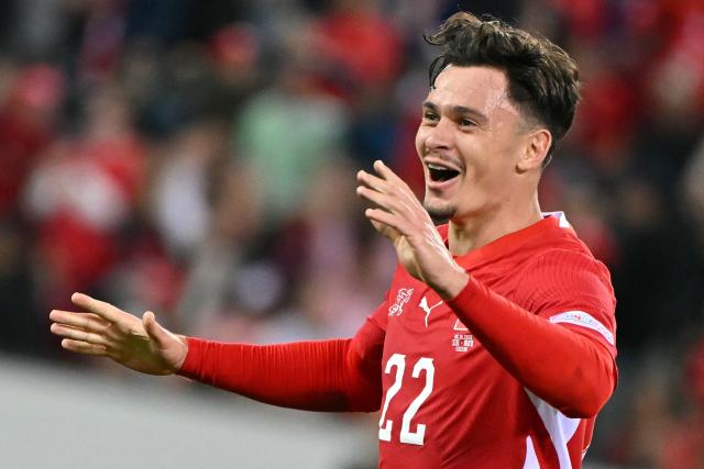 Switzerland's midfielder #22 Fabian Rieder celebrates after scoring Switzerland's first goal during the UEFA Nations League Group B1 football match between Switzerland and North Macedonia at the Thermoplan Arena in Lucerne on October 6, 2026. (Photo by Fabrice COFFRINI / AFP)