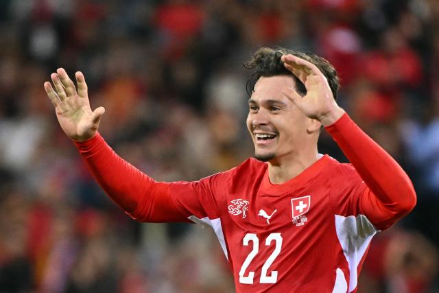 Switzerland's midfielder #22 Fabian Rieder celebrates after scoring Switzerland's first goal during the UEFA Nations League Group B1 football match between Switzerland and North Macedonia at the Thermoplan Arena in Lucerne on October 6, 2026. (Photo by Fabrice COFFRINI / AFP)