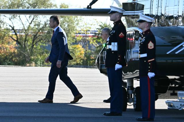 US Defense Secretary Pete Hegseth steps off Marine One ahead of an event with President Donald Trump at Anduril Industries in Sparrows Point, Maryland, on October 6, 2026. Anduril Industries is making an announcement about its future plans at the former Bethlehem Steel location. (Photo by Jim WATSON / AFP)