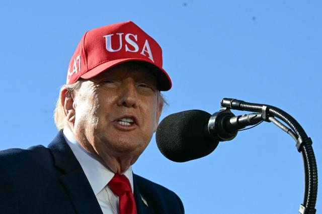 US President Donald Trump speaks at Anduril Industries in Sparrows Point, Maryland, on October 6, 2026. (Photo by Jim WATSON / AFP)