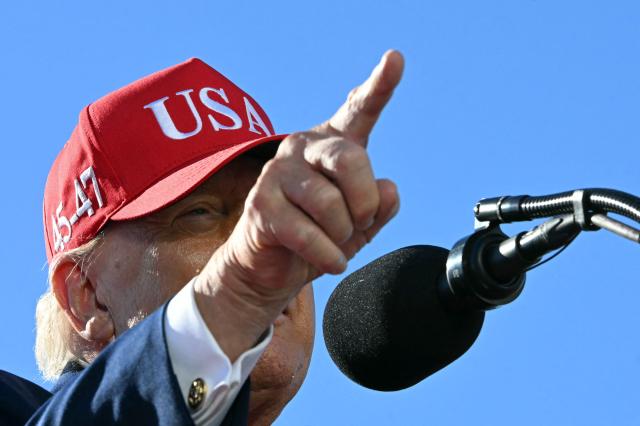 US President Donald Trump speaks at Anduril Industries in Sparrows Point, Maryland, on October 6, 2026. (Photo by Jim WATSON / AFP)