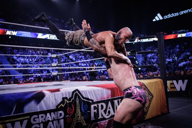 Wrestler Darby Allin (R) and wrestler Kyle Fletcher (R) fight during the AEW Grand Slam event at the Adidas Arena in Paris on October 6, 2026. (Photo by Simon WOHLFAHRT / AFP)