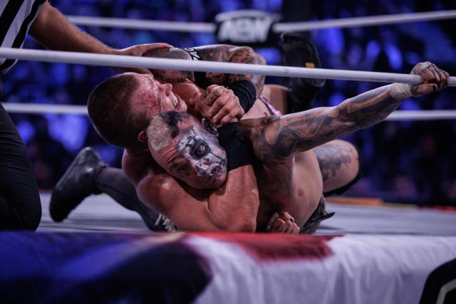 Wrestlers Darby Allin (L) and Kyle Fletcher (R) fight during the AEW Grand Slam event at the Adidas Arena in Paris on October 6, 2026. (Photo by Simon WOHLFAHRT / AFP)