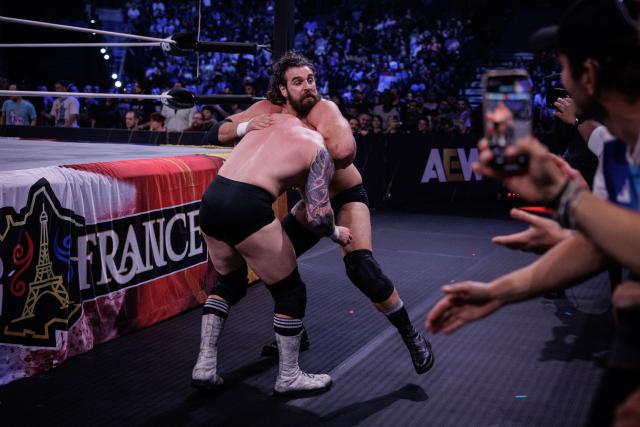 Wrestler Doyle (R) and wrestler Jon Moxley (L) perform during the AEW Grand Slam event at the Adidas Arena in Paris on October 6, 2026. (Photo by Simon WOHLFAHRT / AFP)