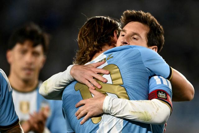 Argentina's midfielder #18 Nico Paz celebrates scoring his team's second goal with teammate Argentina's forward #10 Lionel Messi during the international friendly football match between Argentina and Benin at the Mas Monumental stadium in Buenos Aires on October 6, 2026. (Photo by Luis ROBAYO / AFP)