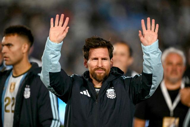 Argentina's forward #10 Lionel Messi waves to fans in a tribute after the international friendly football match between Argentina and Benin at the Mas Monumental stadium in Buenos Aires on October 6, 2026. (Photo by Luis ROBAYO / AFP)