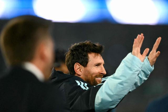 Argentina's forward #10 Lionel Messi waves to fans in a tribute after the international friendly football match between Argentina and Benin at the Mas Monumental stadium in Buenos Aires on October 6, 2026. (Photo by Luis ROBAYO / AFP)