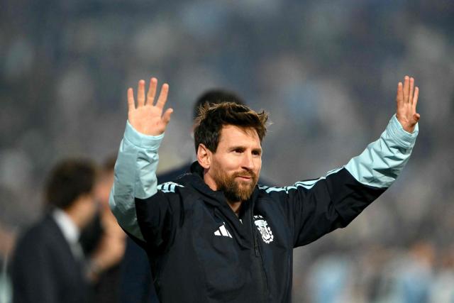Argentina's forward #10 Lionel Messi waves to fans in a tribute after the international friendly football match between Argentina and Benin at the Mas Monumental stadium in Buenos Aires on October 6, 2026. (Photo by Luis ROBAYO / AFP)
