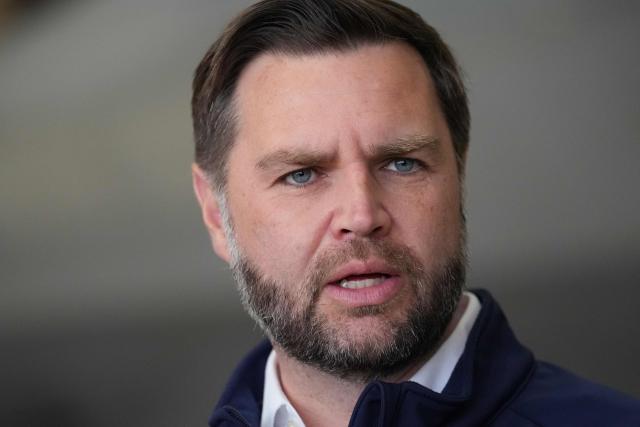 US Vice President JD Vance speaks with reporters before boarding Air Force Two at Elmendorf Air Force Base in Anchorage, Alaska, on October 6, 2026. (Photo by Jacquelyn Martin / POOL / AFP)