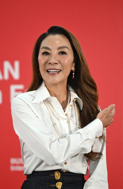 Malaysian actress Michelle Yeoh poses for a photo during a press conference for her film "It's My Time" at the 31st Busan International Film Festival (BIFF) at the Busan Cinema Center in Busan on October 7, 2026. (Photo by Jung Yeon-je / AFP)