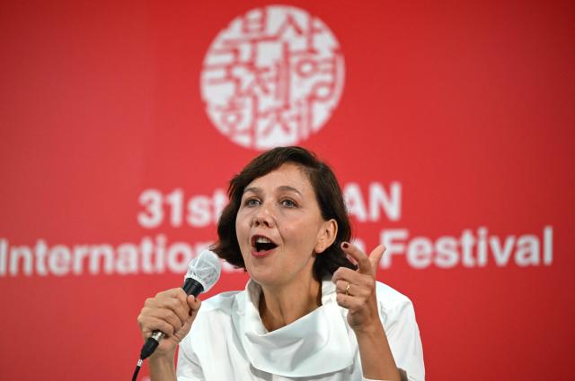 US actress and filmmaker Maggie Gyllenhaal speaks during a press conference for her film "Flesh Impact" at the 31st Busan International Film Festival (BIFF) at the Busan Cinema Center in Busan on October 7, 2026. (Photo by Jung Yeon-je / AFP)