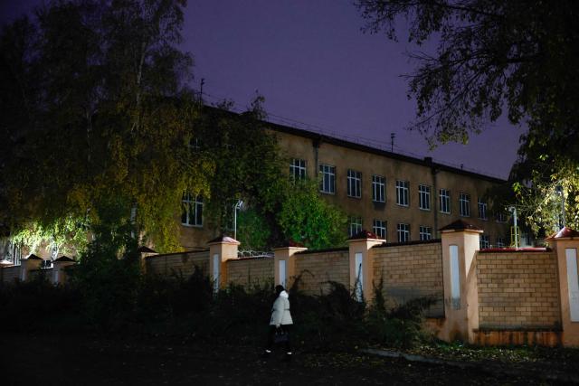 A woman walks past the anti-plague institute in the city of Irkutsk on October 7, 2026. (Photo by TATYANA MAKEYEVA / AFP)