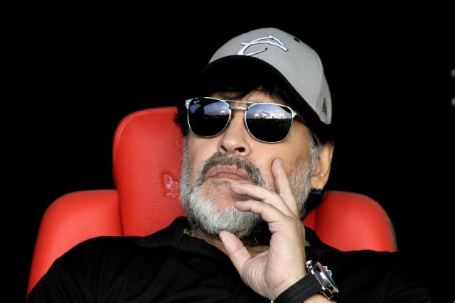 (FILES) The coach of Mexican second division football team Dorados, Argentine Diego Armando Maradona, waits for the start of the second leg match of the Mexican second-division finals against Atletico San Luis, at the Alfonso Lastras Ramirez stadium in San Luis Potosi, Mexico, on May 5, 2019. The trial over Diego Maradona's death enters its final stage in early October 2026 after almost six months of hearings, with the question still unresolved as to whether the football icon's death in late 2020 was unforeseeable or the result of medical negligence during his home care. (Photo by Ulises Ruiz / AFP)