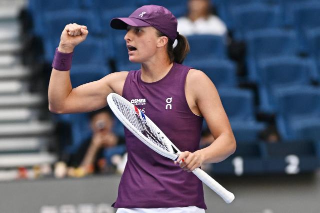 Poland's Iga Swiatek reacts on a point against USA's Iva Jovic during their women's singles match at the China Open tennis tournament in Beijing on October 7, 2026. (Photo by Pedro PARDO / AFP)